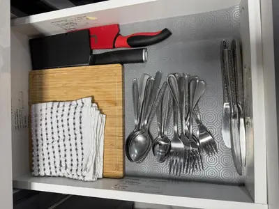 a drawer with silver utensils in a kitchen at Modern Luxury Private Suite with Parking - Mississauga in Mississauga