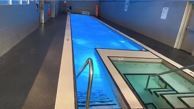 a large swimming pool in a building at CityPlace Lofts Free Parking in Toronto