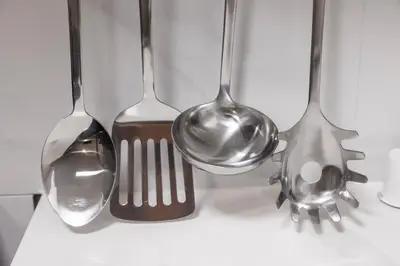a group of spoons sitting on a table at Large Studio Room No 1 in North York in Toronto