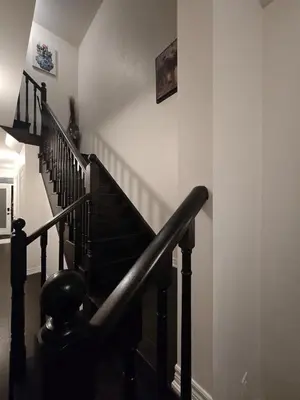 a staircase in a house with a stair case at Elegant 3BR Kleinburg Townhouse Free Parking Wifi Full Kitchen Laundry Near Canadas Wonderland in Vaughan