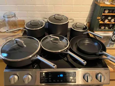 a group of pots and pans on a stove at Rustic and Spacious Lakefront Oasis in Nature in Algonquin Highlands