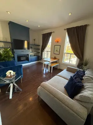 a living room with a couch and a table at 2 Bed Apartment in DT Toronto with Free Parking in Toronto