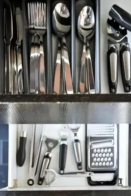 a bunch of utensils are on a shelf at Modern CityPlace Retreat King Bed & Balcony in Toronto