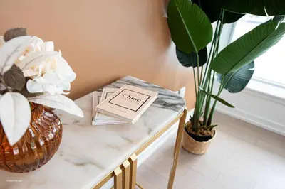 a table with plants and a sign on it at Stunning 2BR Downtown Condo w Huge Private Patio in Toronto
