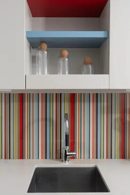 a kitchen counter with a sink and a shelf at Designer 1BR Condo Entertainment District in Toronto
