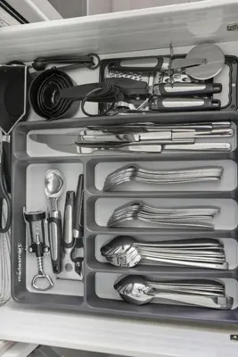 a drawer full of utensils in a refrigerator at Stunning Family-Friendly Parking & City Views in Toronto