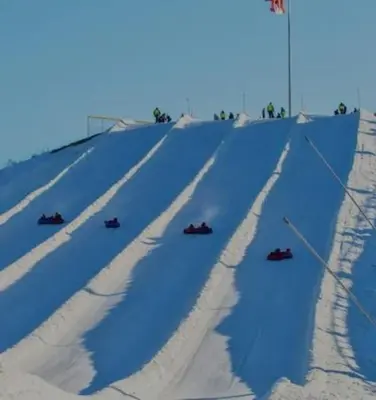 a race on a snow covered slope with a flag at Cozy 2 bedroom ice fishing&skiing in Georgina
