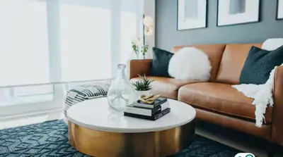 a living room with a couch and a coffee table at Propercare - The Wellingtons in Kitchener