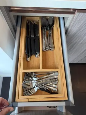 a wooden drawer with utensils in a kitchen at Luxury 2 Bedroom 2 Baths Condo Downtown Toronto in Toronto