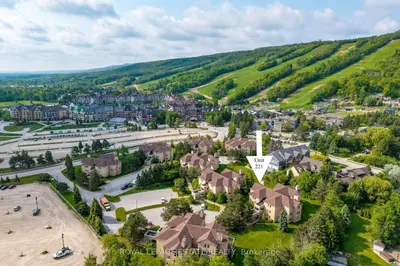 an aerial view of a town with a mountain at Mountain Home in the Heart of Blue Mountain Village in Blue Mountains