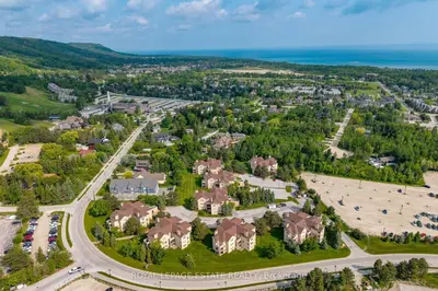 an aerial view of a residential neighborhood with houses at Mountain Home in the Heart of Blue Mountain Village in Blue Mountains