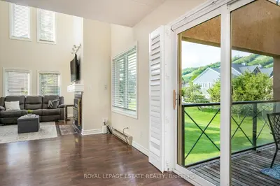 a living room with a large sliding glass door at Mountain Home in the Heart of Blue Mountain Village in Blue Mountains