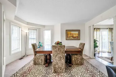 a dining room with a table and chairs at Exhilarating Castle Vibes In Toronto Area in Ajax