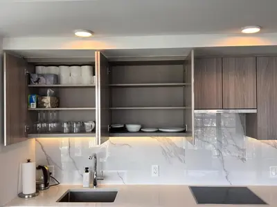 a kitchen with a sink and a counter top at Luxury 76 floor 2B2B Downtown Toronto Skyline View in Toronto