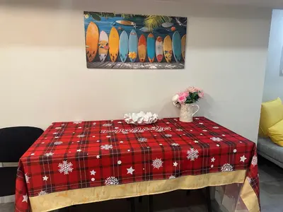 a table with a plaid table cloth on it at Newly Renovated and Spacious 3BR Private Apartment with 3 Baths & Parking in Richmond Hill