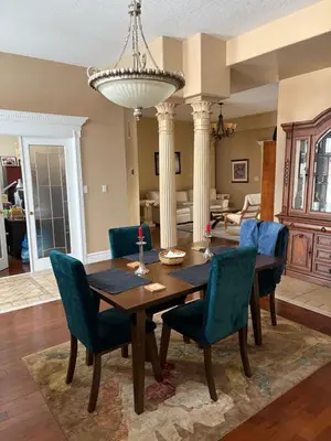 a dining room with a table and chairs at Lakeview in Colborne