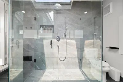 a shower stall in a bathroom with a toilet at 4BR Family Home - Dog-Friendly, Huge Yard, 5 Beds in Pickering