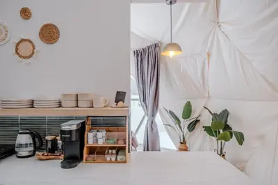 a kitchen with a coffee maker on a counter at 'Twilight' Boho-Luxe Glamping Dome at Marmora Retreat in Marmora