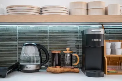 a coffee maker and a toaster on a kitchen counter at 'Twilight' Boho-Luxe Glamping Dome at Marmora Retreat in Marmora