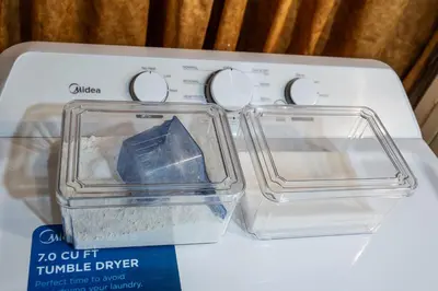 a stove top with two glass pyrex dishes on it at Newly Renovated 2BR Basement Suite, Private Entry in Pickering