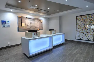 a room with a counter with boxes on it at Holiday Inn Express & Suites Toronto Airport West by IHG in Mississauga