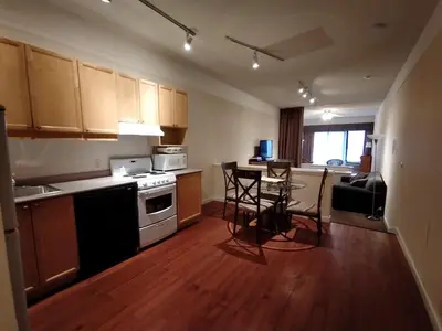an empty kitchen with a table and chairs in it at Royal Harbour Resort in Thornbury