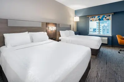 a hotel room with two beds and a window at Holiday Inn Express & Suites Vaughan-Southwest by IHG in Vaughan