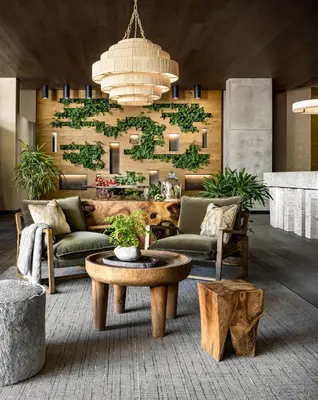a living room with a couch and a table at 1 Hotel Toronto in Toronto
