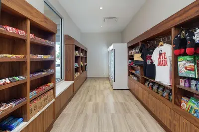 a store aisle with shelves of food and merchandise at Doubletree by Hilton Toronto Airport, ON in Toronto