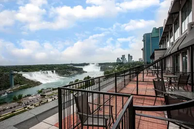 a balcony with a view of the niagara river at The Brock Niagara Falls Fallsview, Tapestry by Hilton in Niagara Falls