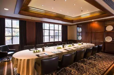 a large conference room with a long table and chairs at The Yorkville Royal Sonesta Hotel Toronto in Toronto