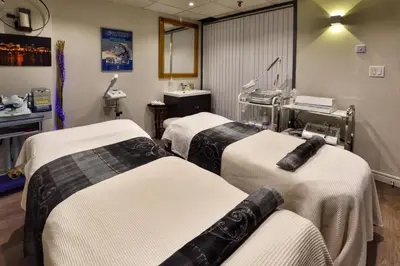 a hospital room with two beds in a room at Holiday Inn Toronto International Airport by IHG in Toronto