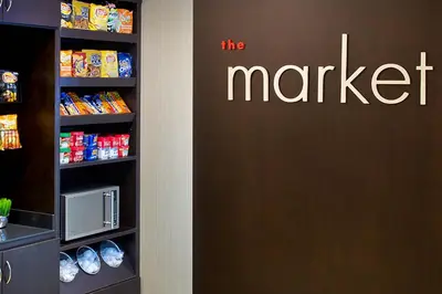 a door to a refrigerator with the market written on it at Courtyard by Marriott Niagara Falls in Niagara Falls