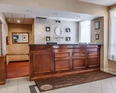 a lobby with a bar in a hospital at Comfort Inn in Mississauga