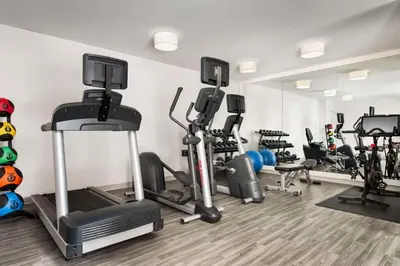 a gym with several treadmills and cardio equipment at Sonesta ES Suites Toronto Markham in Markham