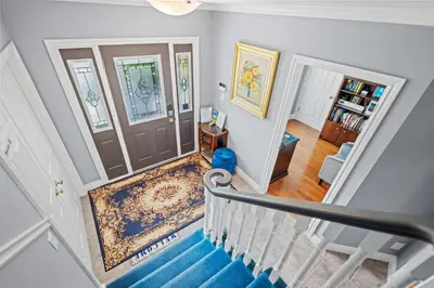 a staircase leading up to a home with a door at Charlottetown House in Niagara on the Lake