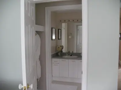 a bathroom with a sink and a mirror at Molly's Retreat B and B in Orangeville