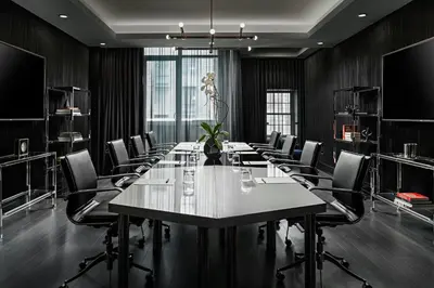 a conference room with a long table and chairs at BISHA, a Luxury Collection Hotel, Toronto in Toronto