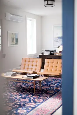 a living room with a couch and a coffee table at South Landing Inn in Niagara on the Lake