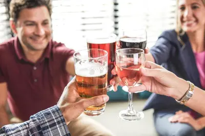 a group of people holding glasses of beer at Staybridge Suites Oakville Burlington by IHG in Oakville