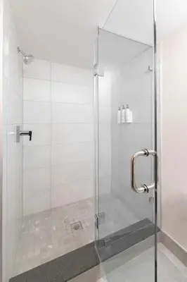a shower with a glass door in a bathroom at Fairfield Inn & Suites by Marriott Toronto Brampton in Brampton