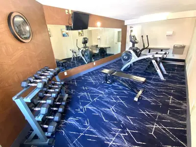 a fitness room with a gym with exercise equipment at Comfort Inn in St. Catharines