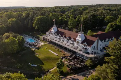 an aerial view of a building with a swimming pool at Windermere House in Windermere