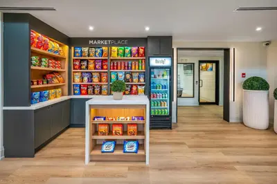 a grocery store with a market lease sign on the wall at Comfort Inn in Guelph