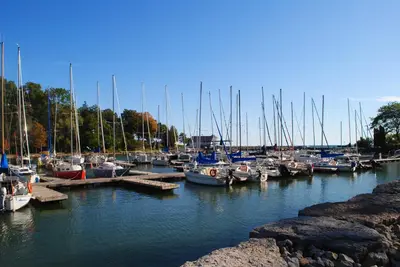 a bunch of boats are docked in a marina at Holiday Inn & Suites Oakville at Bronte by IHG in Oakville