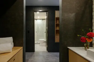 a bathroom with a sink and a toilet in a room at The Anndore House, part of JDV by Hyatt in Toronto
