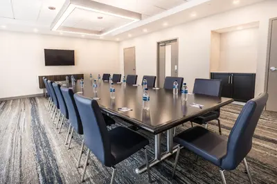 a conference room with a long table and chairs at Holiday Inn Express Toronto-North York by IHG in Toronto