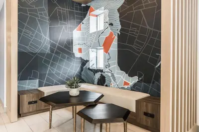 a dining area with a table and two chairs at Holiday Inn Express Toronto-North York by IHG in Toronto