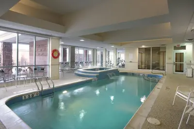 a large swimming pool in a hotel room at Courtyard by Marriott Toronto Vaughan in Vaughan