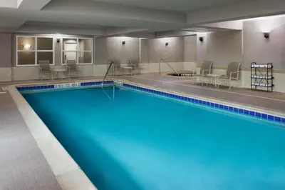 a large swimming pool in a hotel room at Residence Inn by Marriott Mississauga-Airport Corporate Centre West in Mississauga
